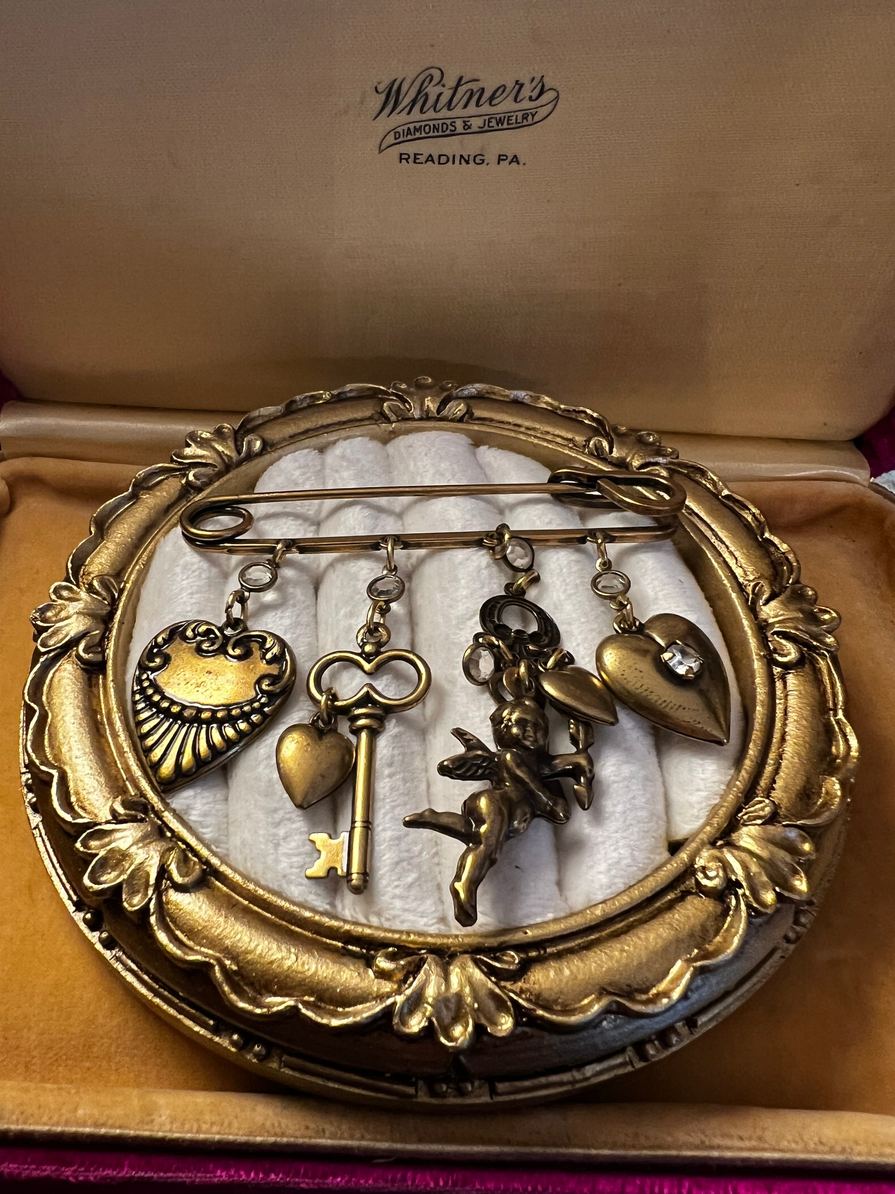 Vintage 90s gold tone charmed kilt pin