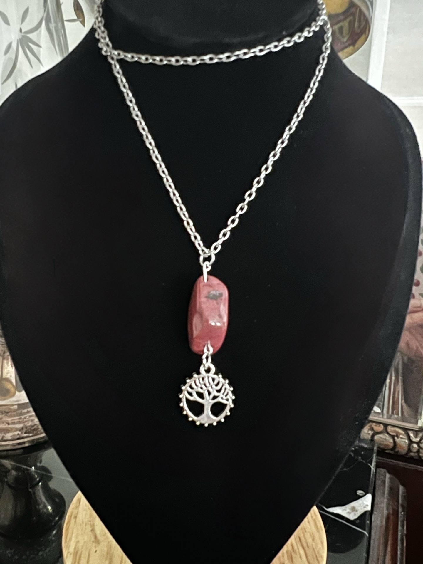 Rhodonite and tree of life charm on 20 inch silver tone chain